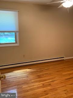102 Bunker Hill Road New Cumberland, PA 17070 - Photo 8 of 23 a view of a room with wooden floor
