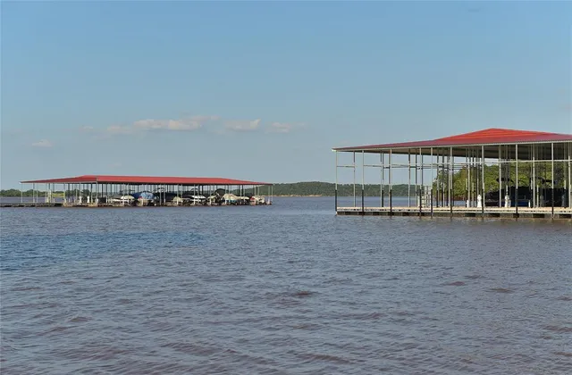 a view of a street with a building in the background