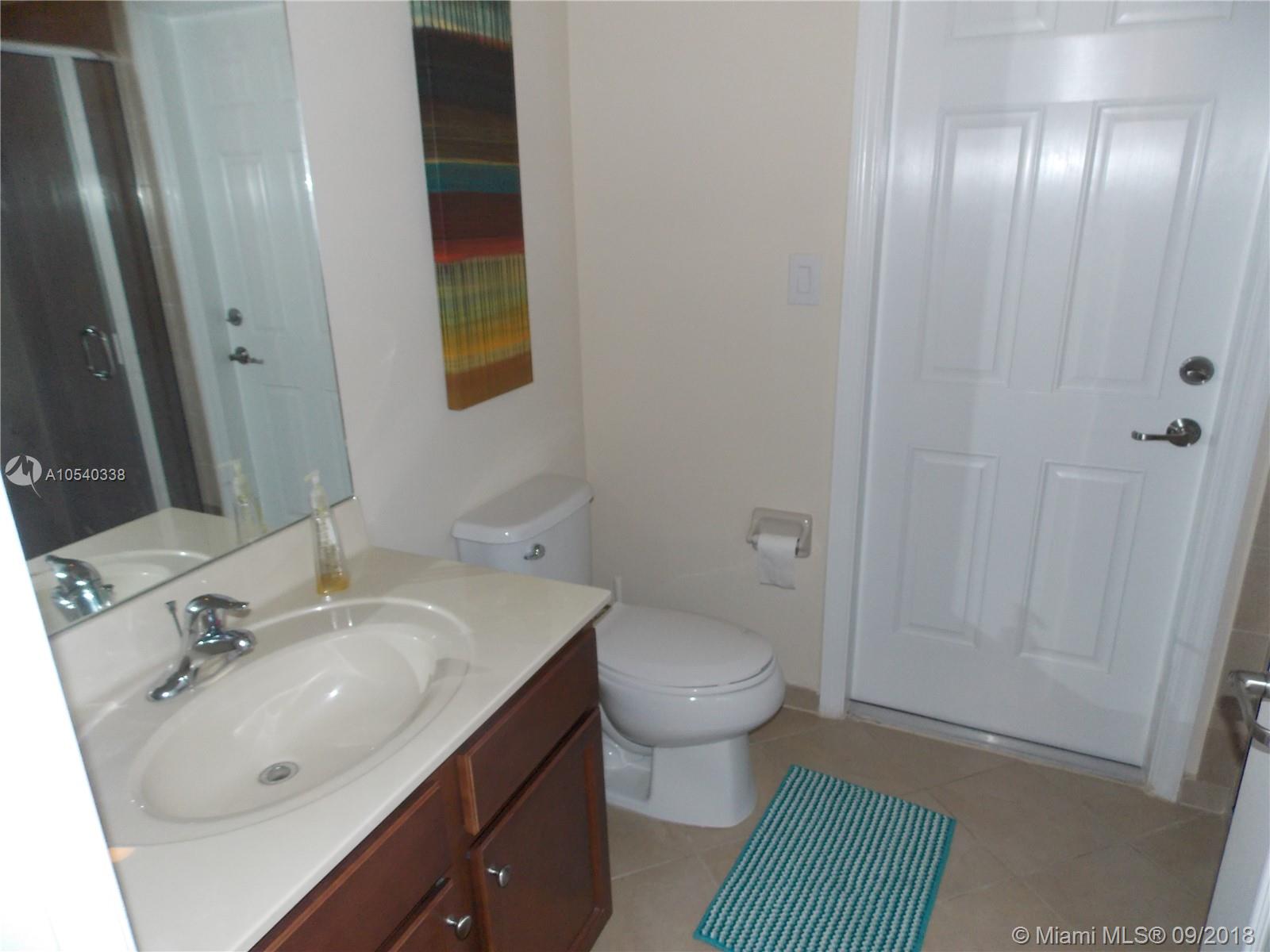 11646 Southwest 234th Street Homestead, FL 33032 - Photo 16 of 63 1st Floor Bathroom
