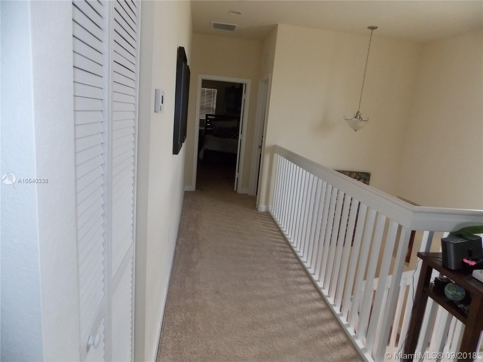 11646 Southwest 234th Street Homestead, FL 33032 - Photo 28 of 63 Hallway to Master