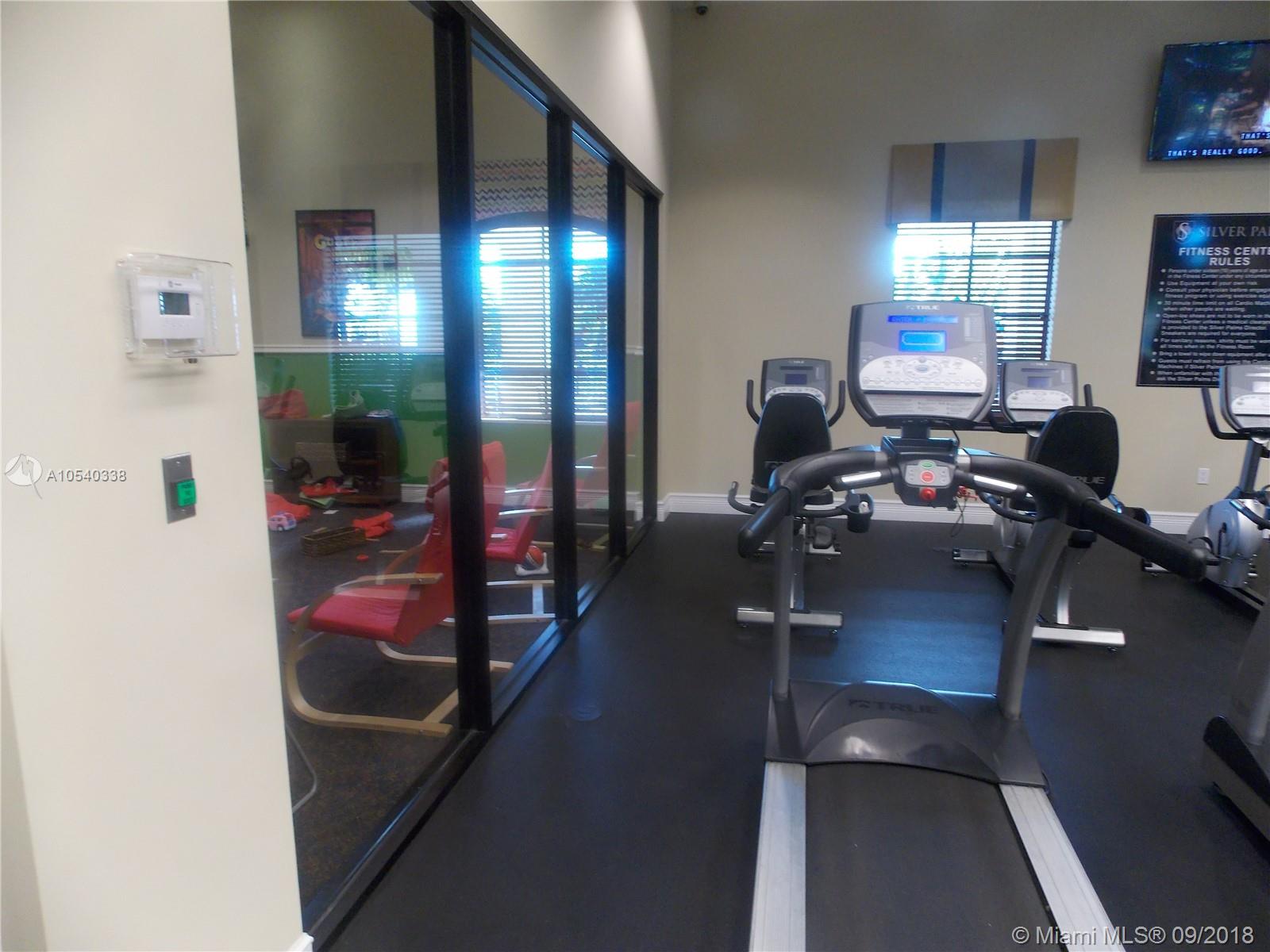 11646 Southwest 234th Street Homestead, FL 33032 - Photo 57 of 63 Silver Palms Clubhouse Gym