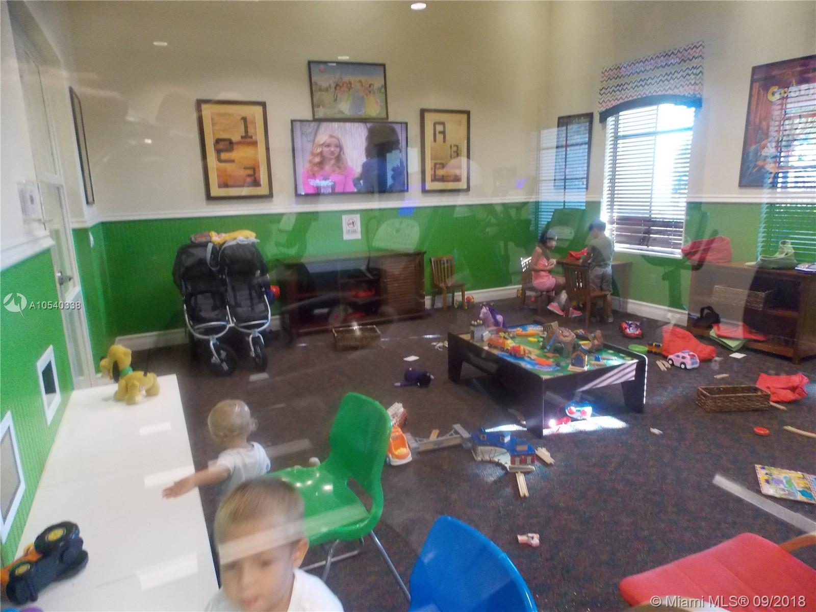 11646 Southwest 234th Street Homestead, FL 33032 - Photo 58 of 63 Silver Palms Clubhouse Children Rec room