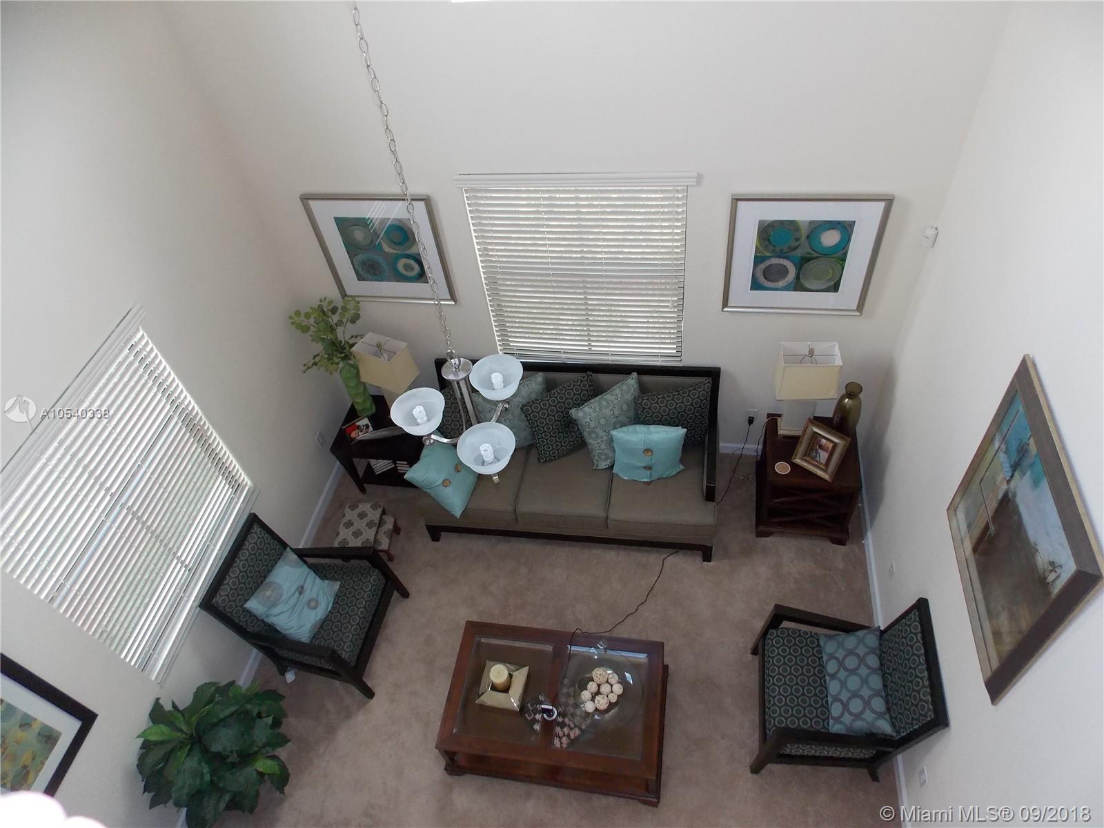 11646 Southwest 234th Street Homestead, FL 33032 - Photo 10 of 63 Living room View from mezzanine