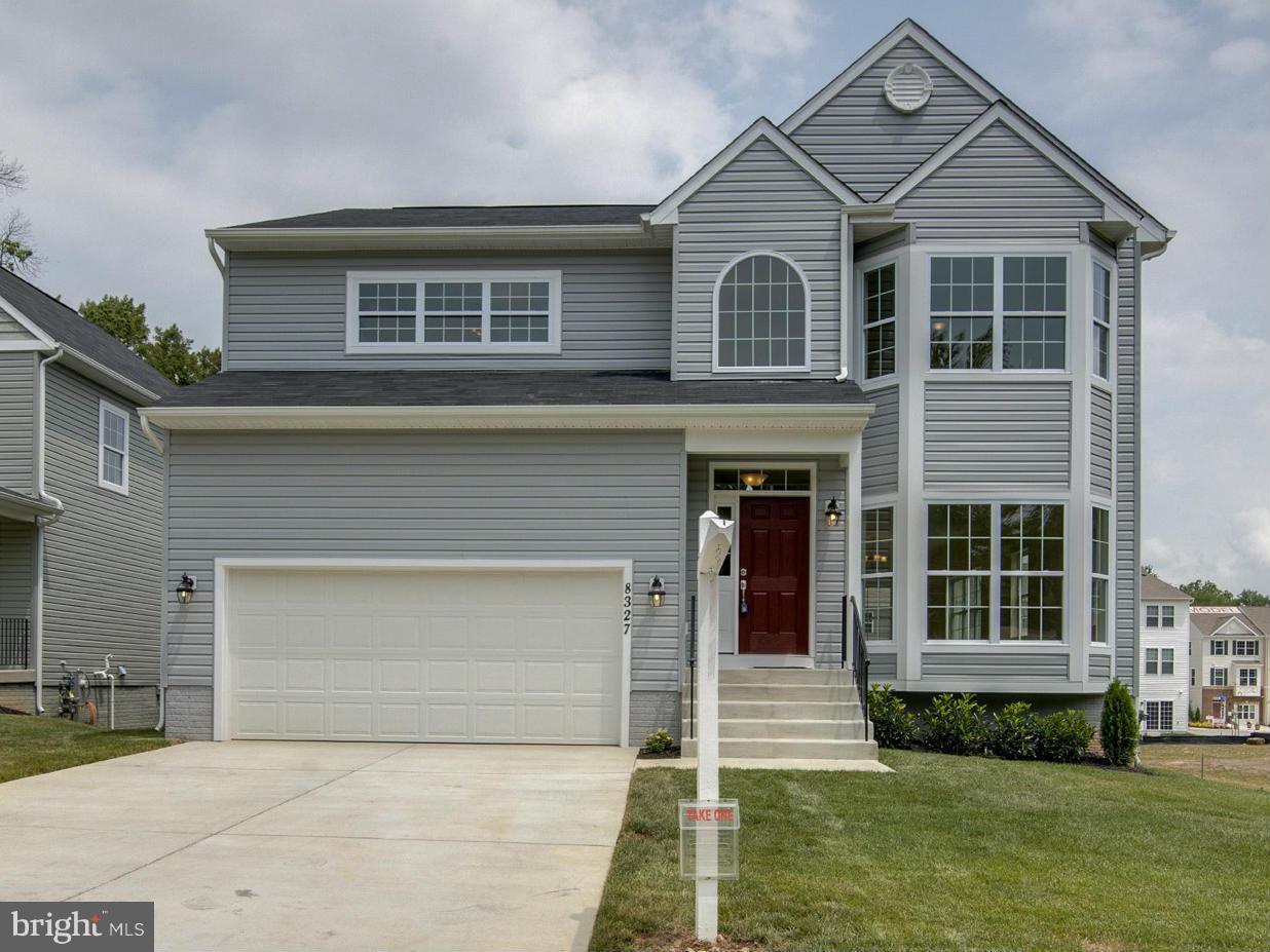 8327 Jacobs Road West Severn, MD 21144 - Photo 2 of 27 EXTERIOR FRONT - 2-CAR GARAGE - CONCRETE DRIVEWAY