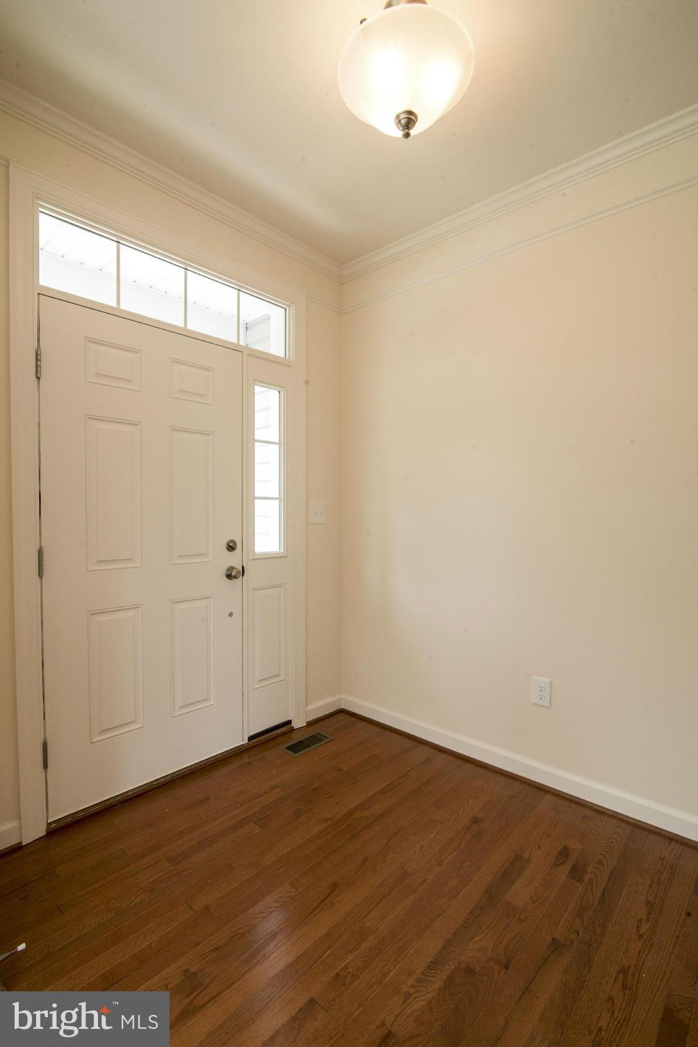 8327 Jacobs Road West Severn, MD 21144 - Photo 3 of 27 FOYER WITH GLEAMING HARDWOODS