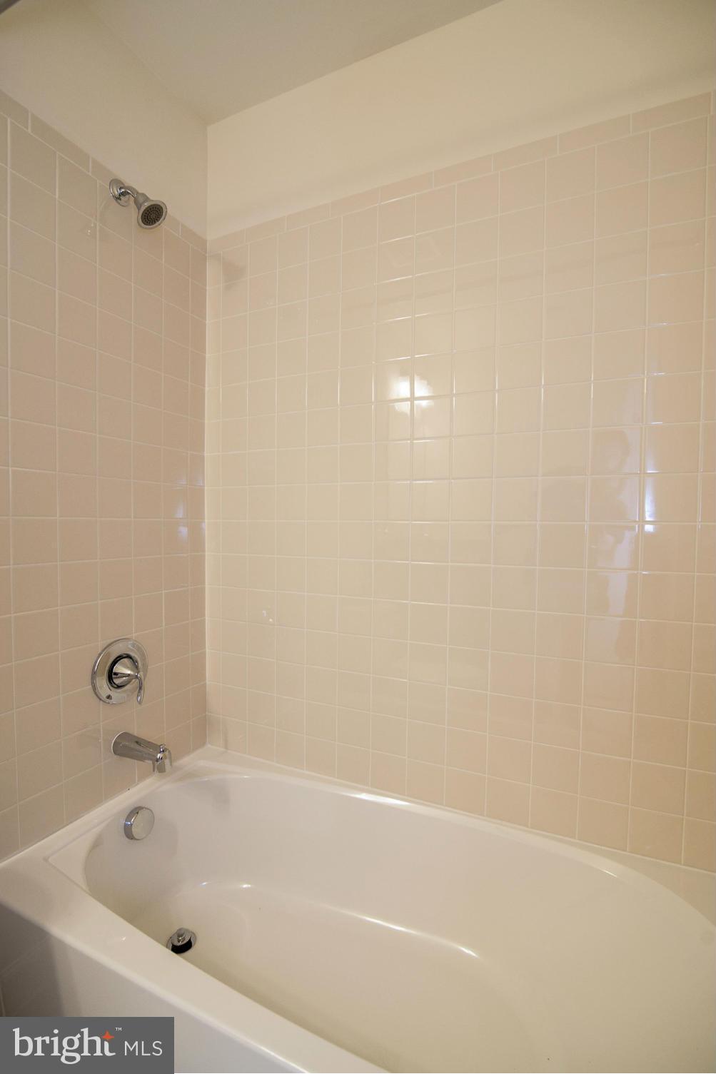 8327 Jacobs Road West Severn, MD 21144 - Photo 24 of 27 HALL BATH - CERAMIC FLOOR AND SURROUND