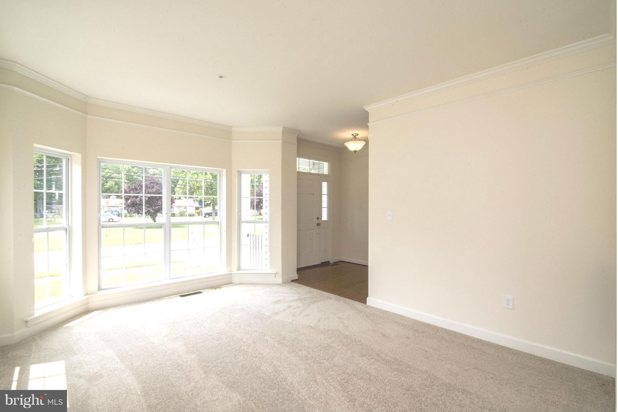 8327 Jacobs Road West Severn, MD 21144 - Photo 4 of 27 LIVING ROOM AND FOYER