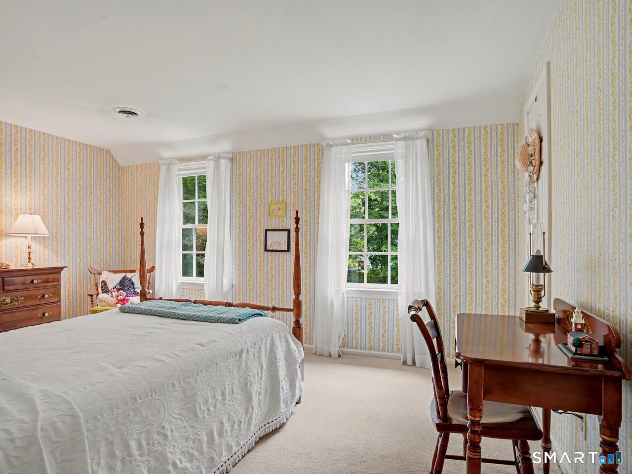 86 Fire Hill Road Redding, CT 06896 - Photo 25 of 36 a bedroom with a bed table chair and a window