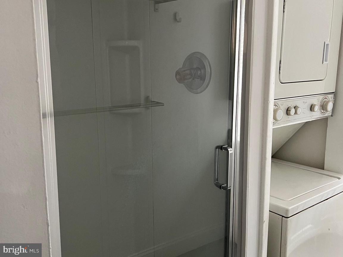308 South Street, Unit 2 Philadelphia, PA 19147 - Photo 6 of 7 a bathroom with a shower and vanity