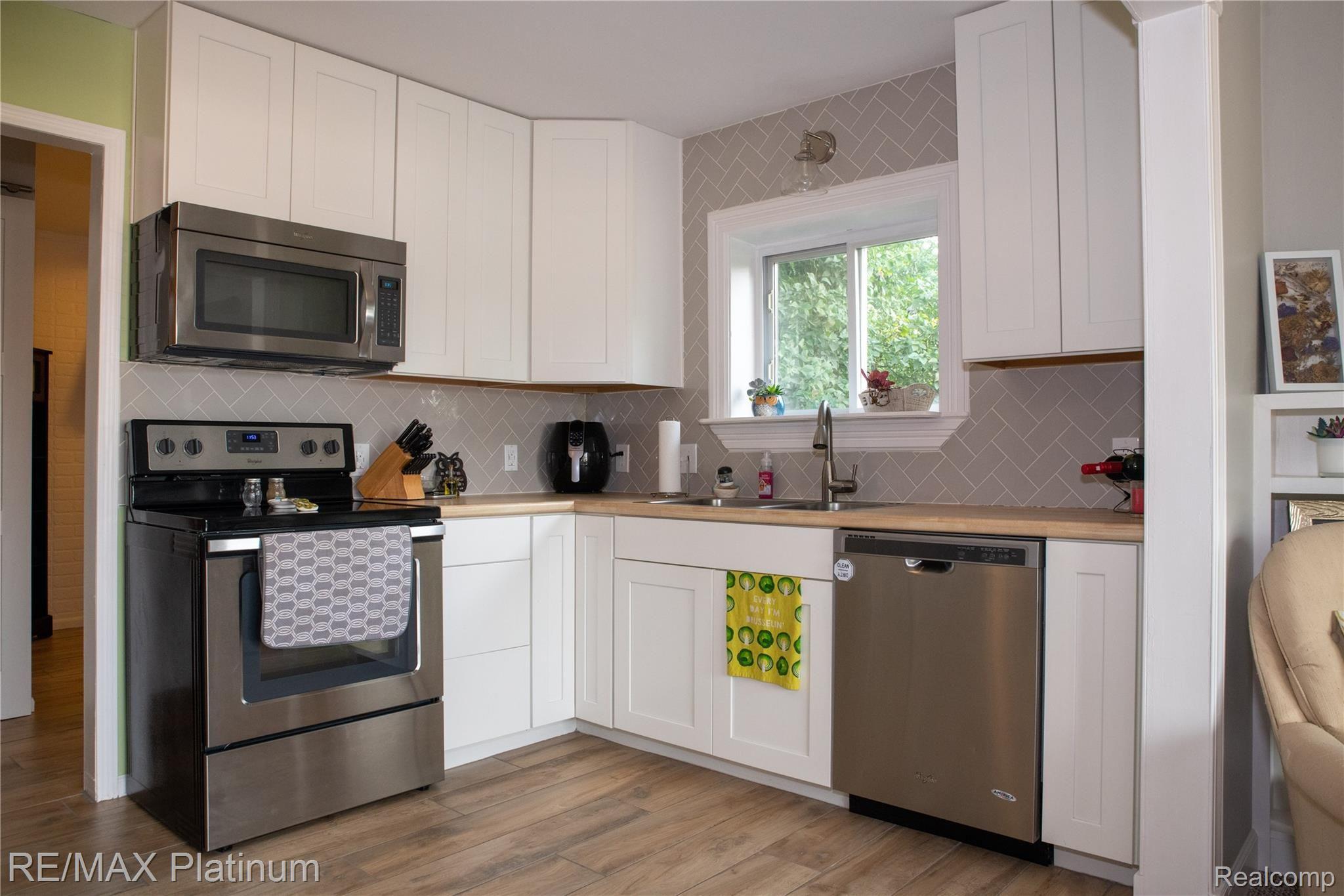 1333 Brighton Lake Road Brighton, MI 48116 - Photo 2 of 12 Beautifully updated Kitchen with all stainless appliances included