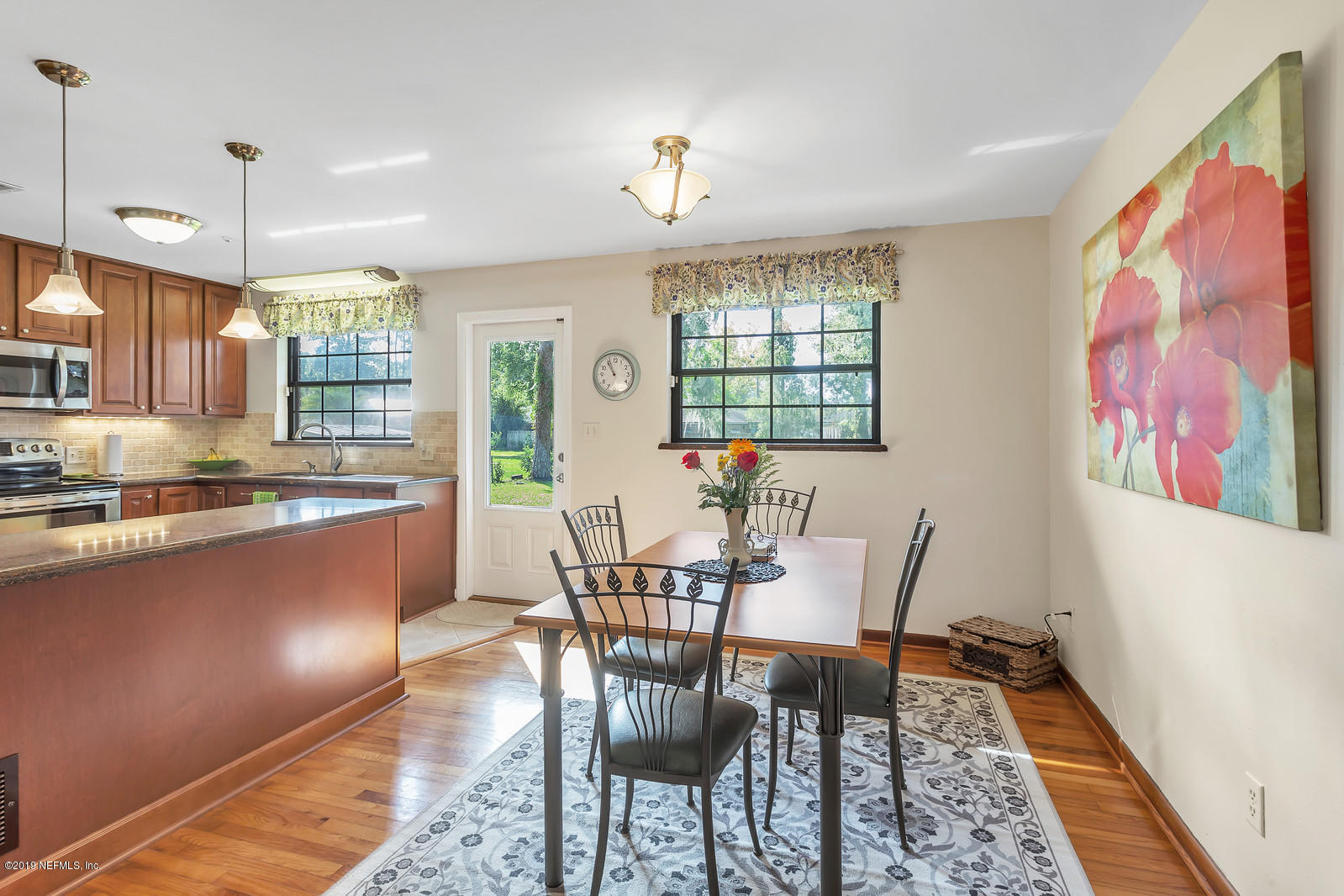 8702 Sanchez Road Jacksonville, FL 32217 - Photo 6 of 34 a view of a dining room with furniture window and outside view
