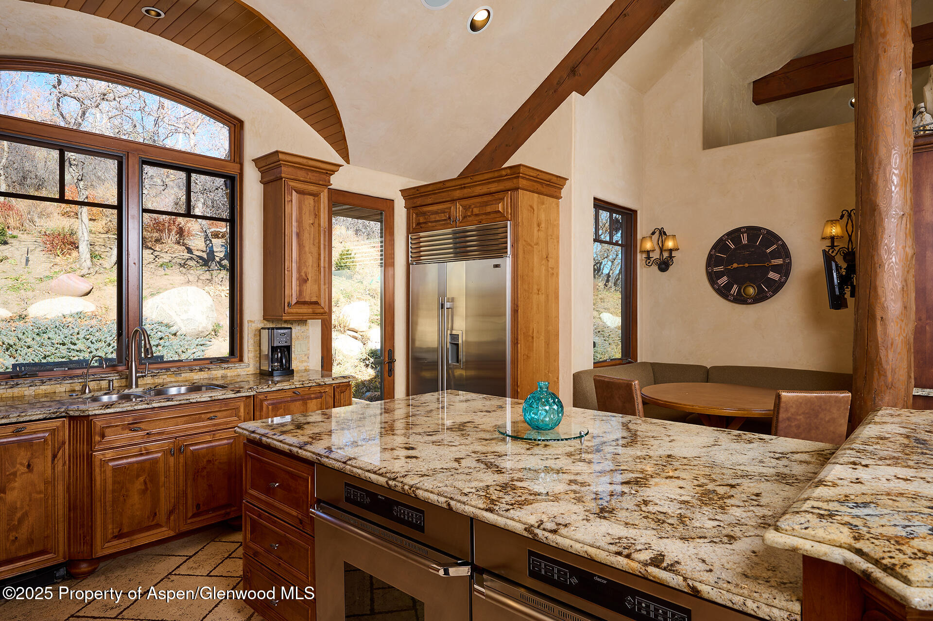 121 Oak Ridge Road Snowmass Village, CO 81615 - Photo 11 of 28 a bathroom with a granite countertop sink and a large mirror