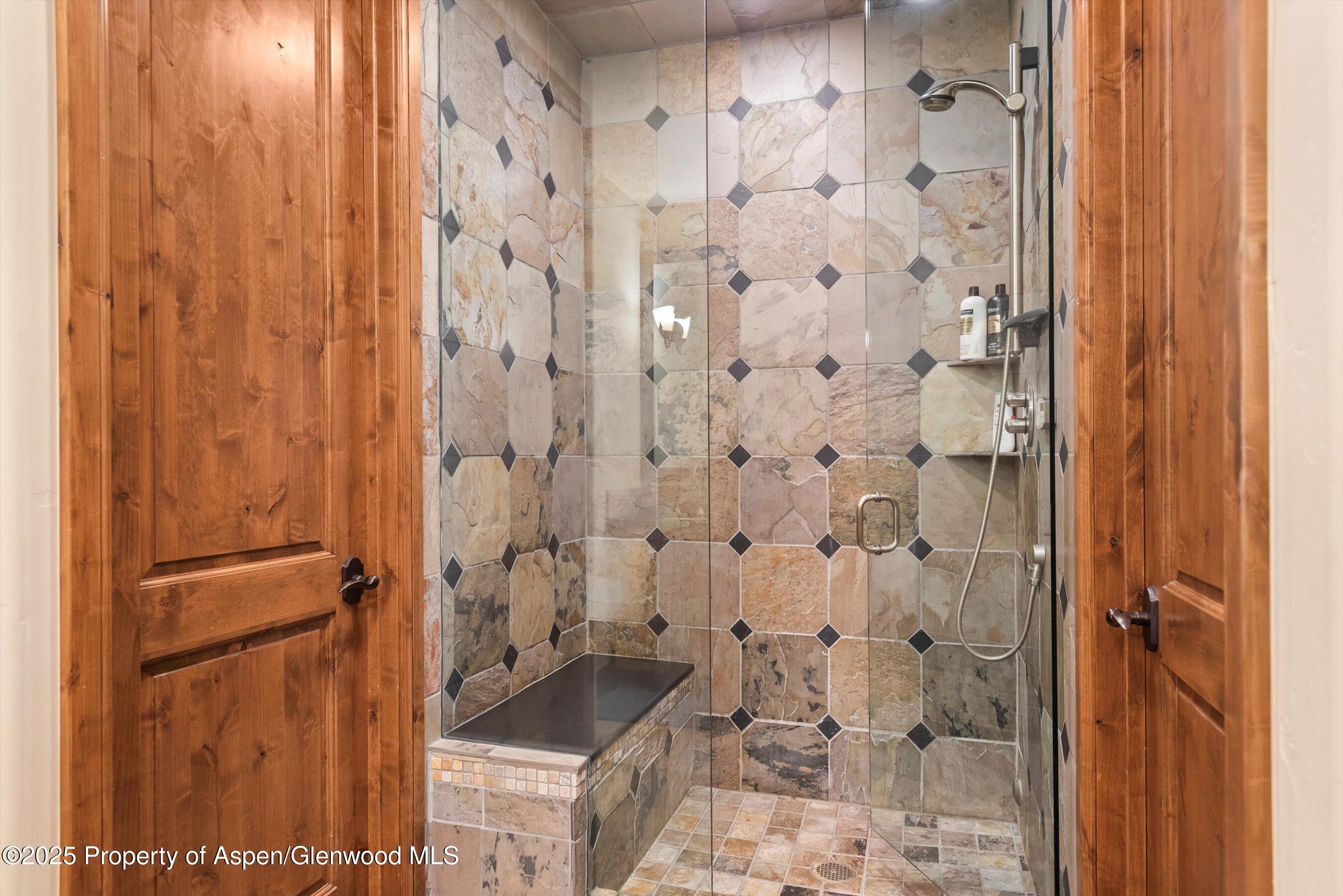 121 Oak Ridge Road Snowmass Village, CO 81615 - Photo 23 of 28 a bathroom with a granite countertop shower and a sink
