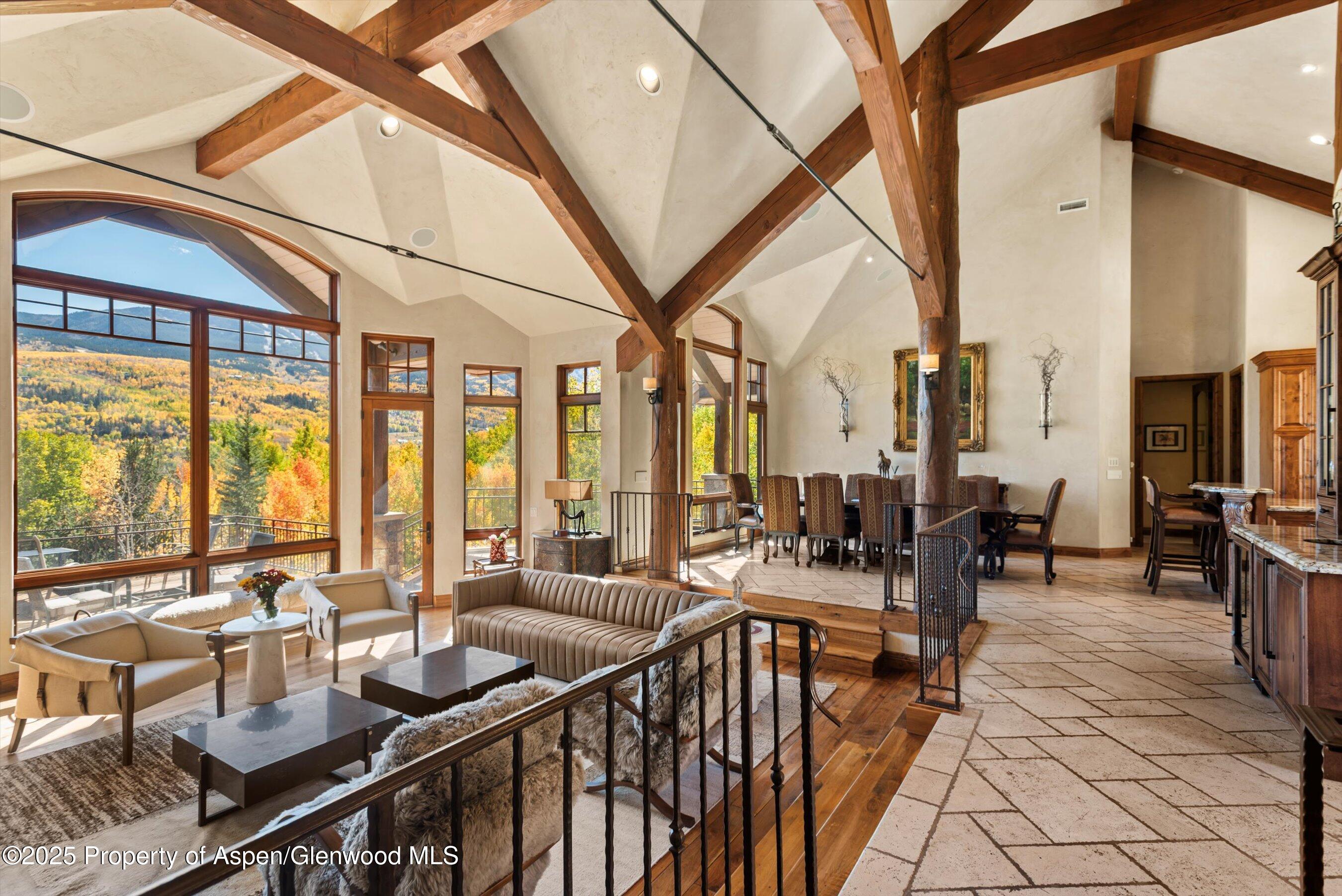 121 Oak Ridge Road Snowmass Village, CO 81615 - Photo 3 of 28 a very nice looking living room with furniture and floor to ceiling windows
