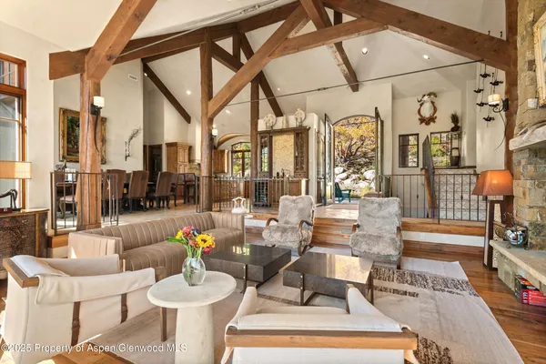 a building outdoor space with patio furniture and a potted plant