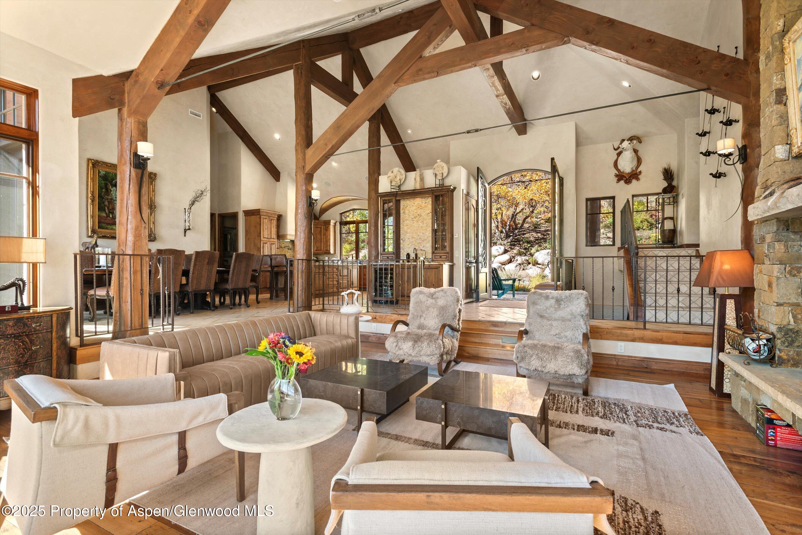 121 Oak Ridge Road Snowmass Village, CO 81615 - Photo 8 of 28 a building outdoor space with patio furniture and a potted plant