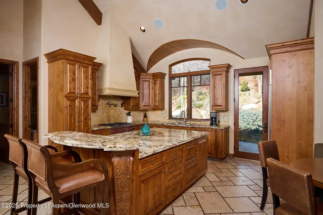 a spacious bathroom with a granite countertop tub and a sink
