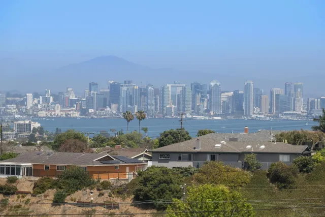 a view of a city with tall buildings