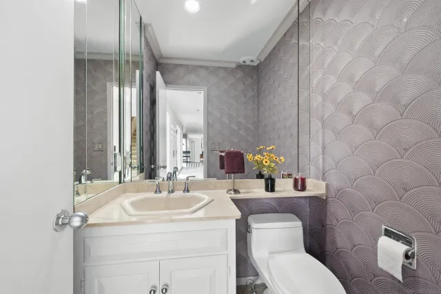 a bathroom with a window and a shower