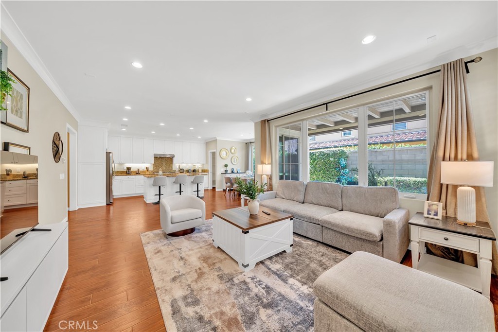 75 Gardenstone Path Irvine, CA 92620 - Photo 6 of 65 a living room with furniture and a large window