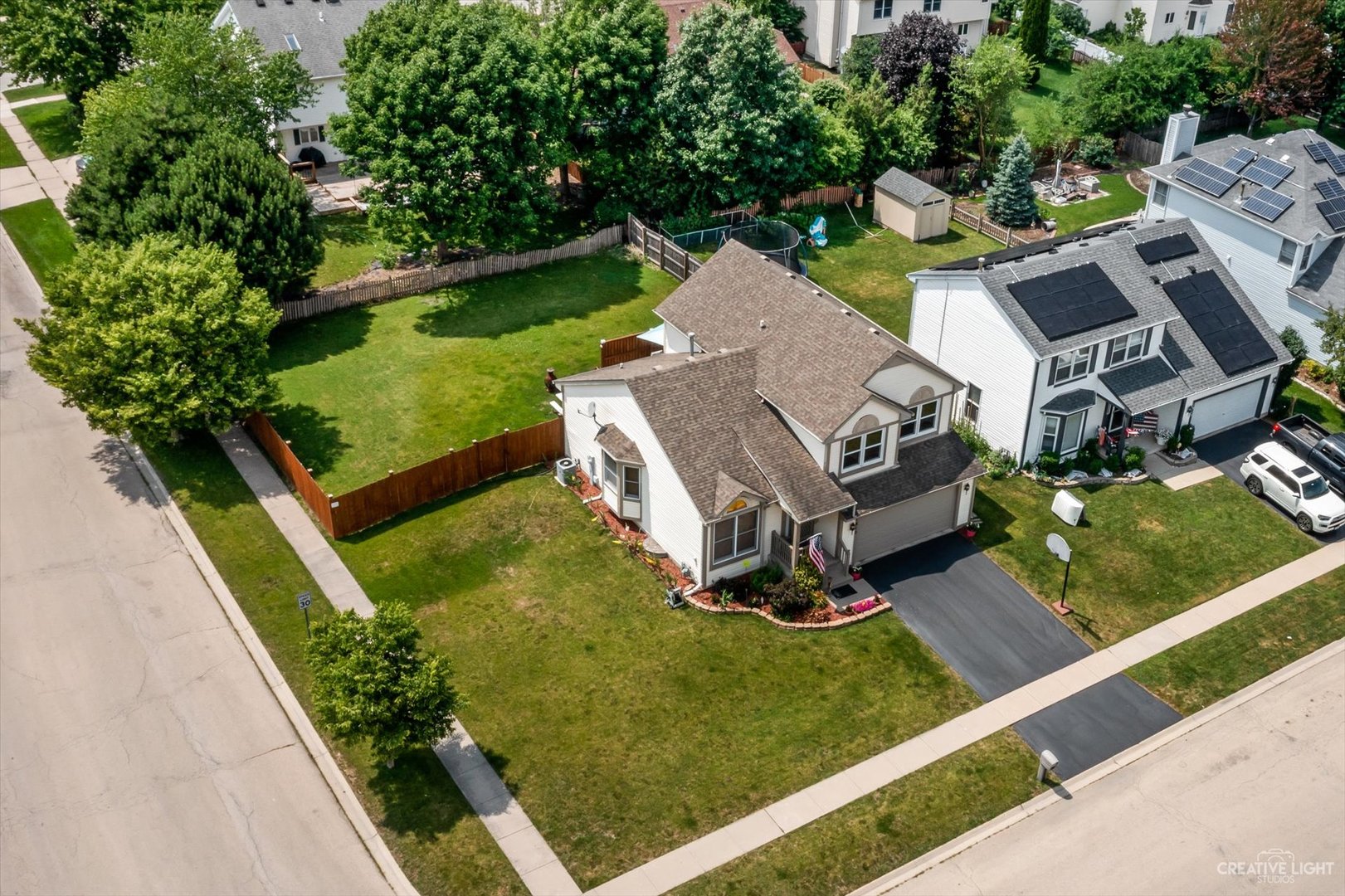 1813 Olde Mill Road Plainfield, IL 60586 - Photo 5 of 34 an aerial view of a house with swimming pool