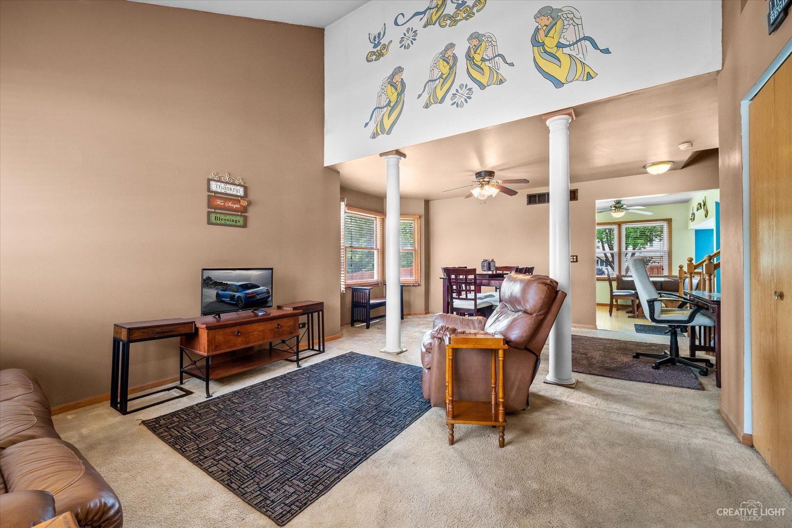 1813 Olde Mill Road Plainfield, IL 60586 - Photo 6 of 34 a living room with furniture and a rug