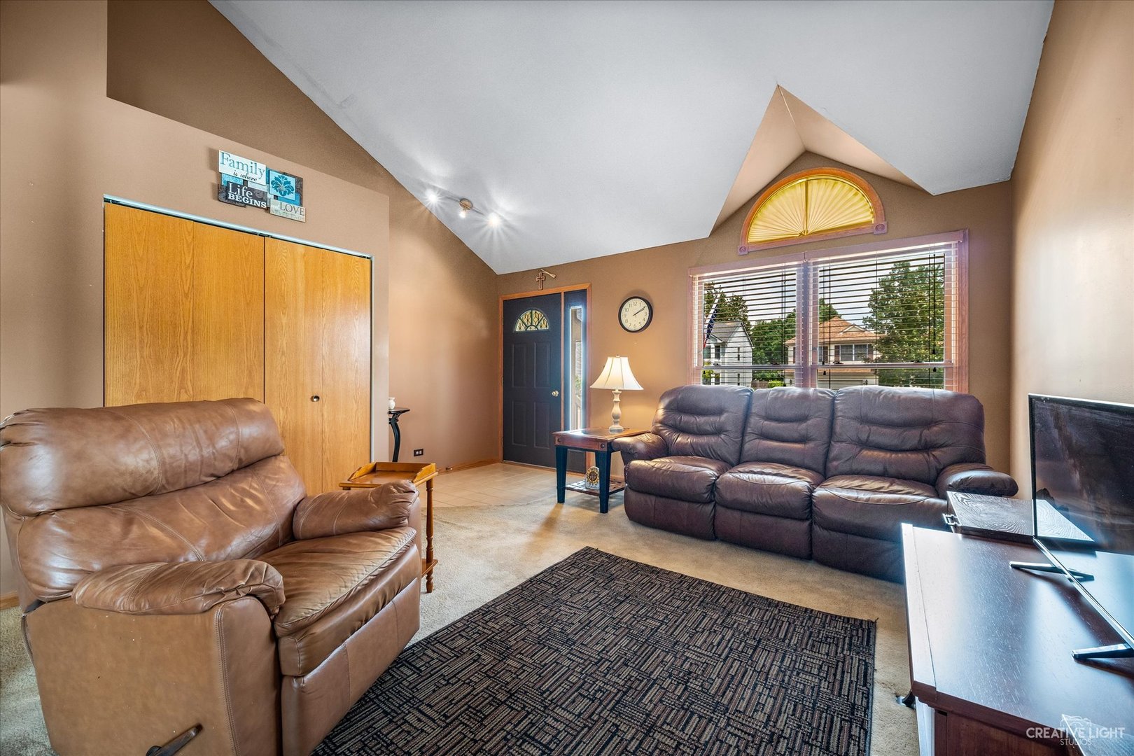 1813 Olde Mill Road Plainfield, IL 60586 - Photo 8 of 34 a living room with furniture and a window