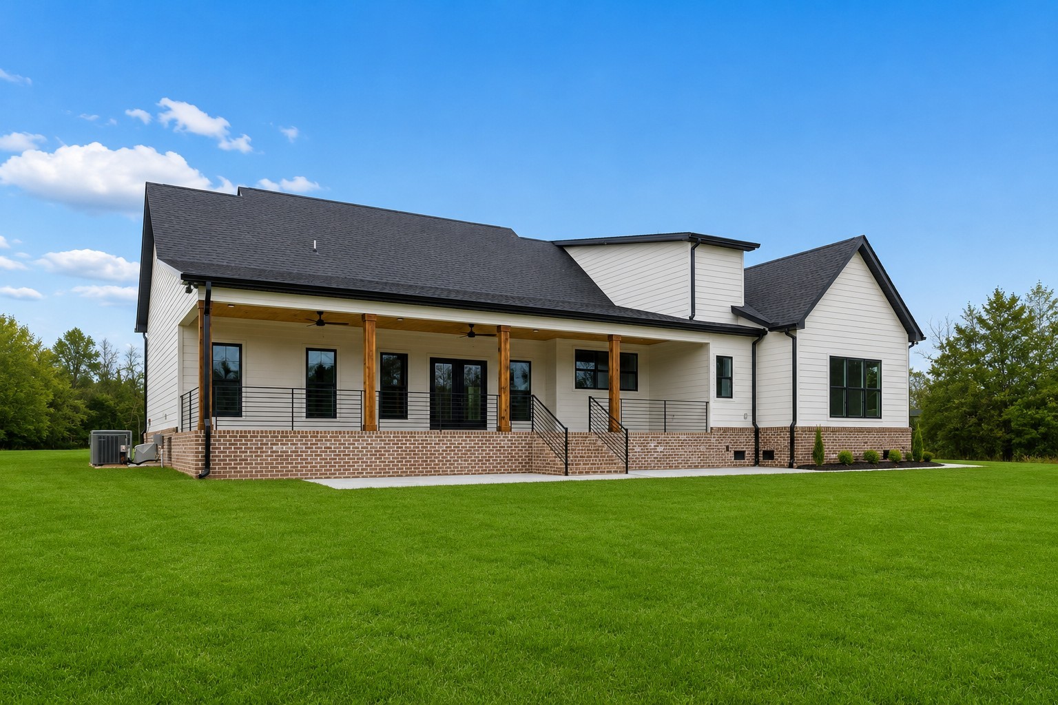 9665 McKee Road Lascassas, TN 37085 - Photo 64 of 73 a front view of a house with a garden and yard