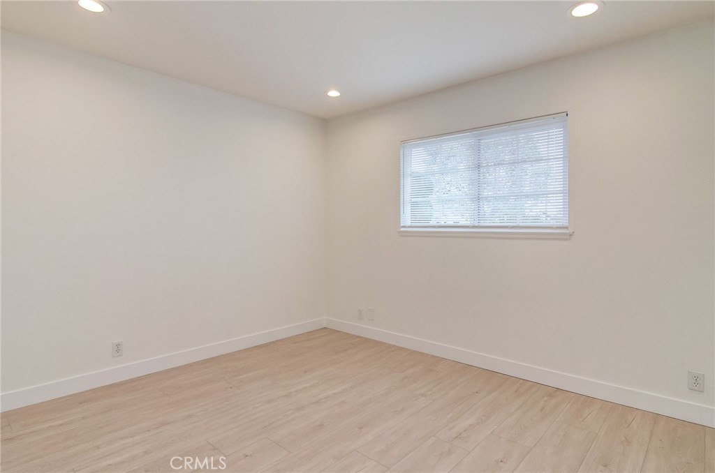4541 Myra Avenue Cypress, CA 90630 - Photo 26 of 42 an empty room with a window