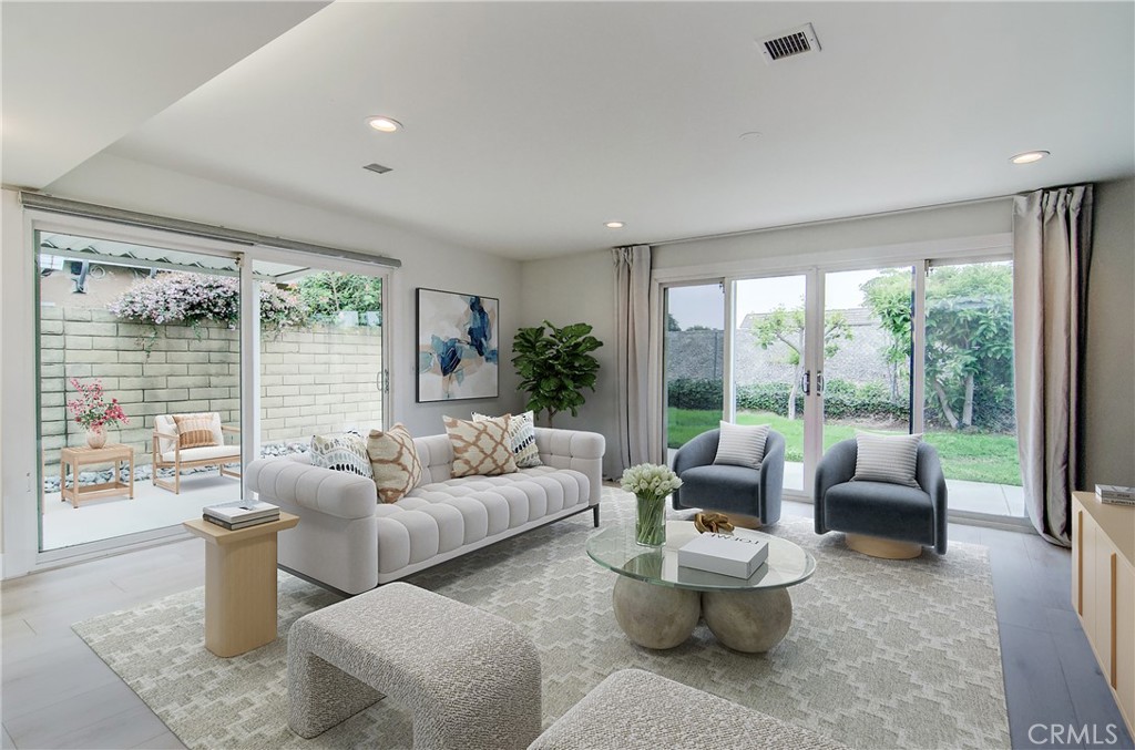 4541 Myra Avenue Cypress, CA 90630 - Photo 4 of 42 a living room with furniture and a large window