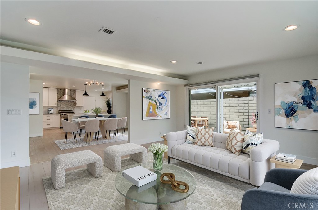 4541 Myra Avenue Cypress, CA 90630 - Photo 5 of 42 a living room with furniture and a large window