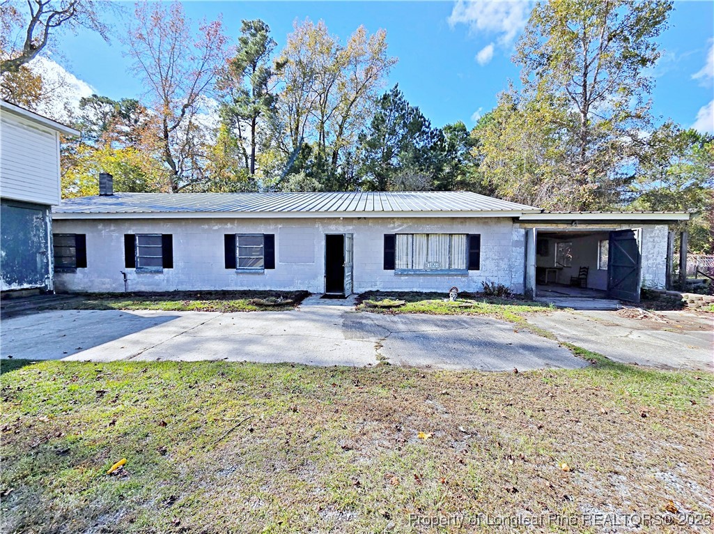 764 Old Vander Road Fayetteville, NC 28312 - Photo 39 of 50 a view of a house with swimming pool and porch