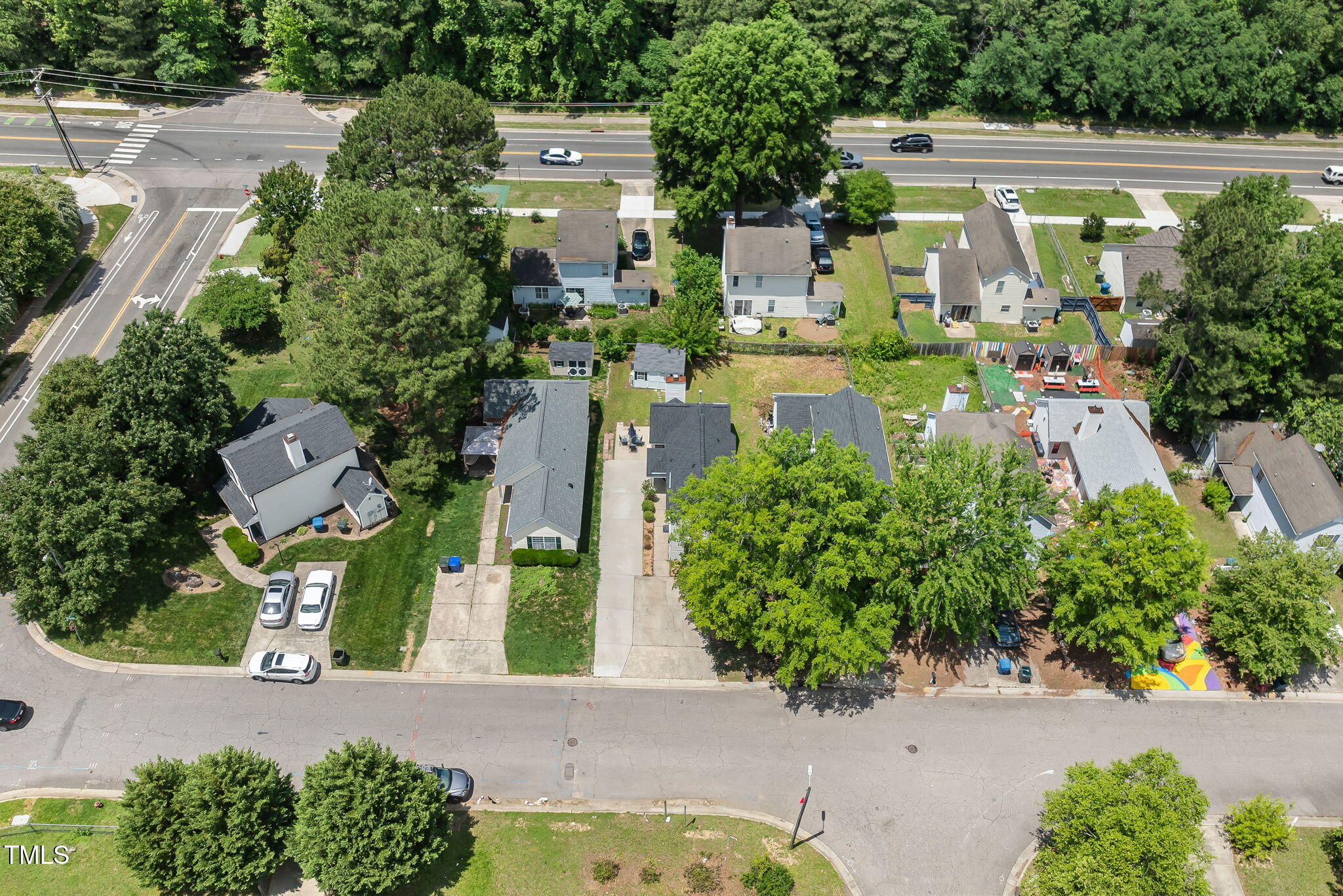 505 Stratton Way Durham, NC 27704 - Photo 22 of 34 an aerial view of a house with a yard swimming pool outdoor seating and yard