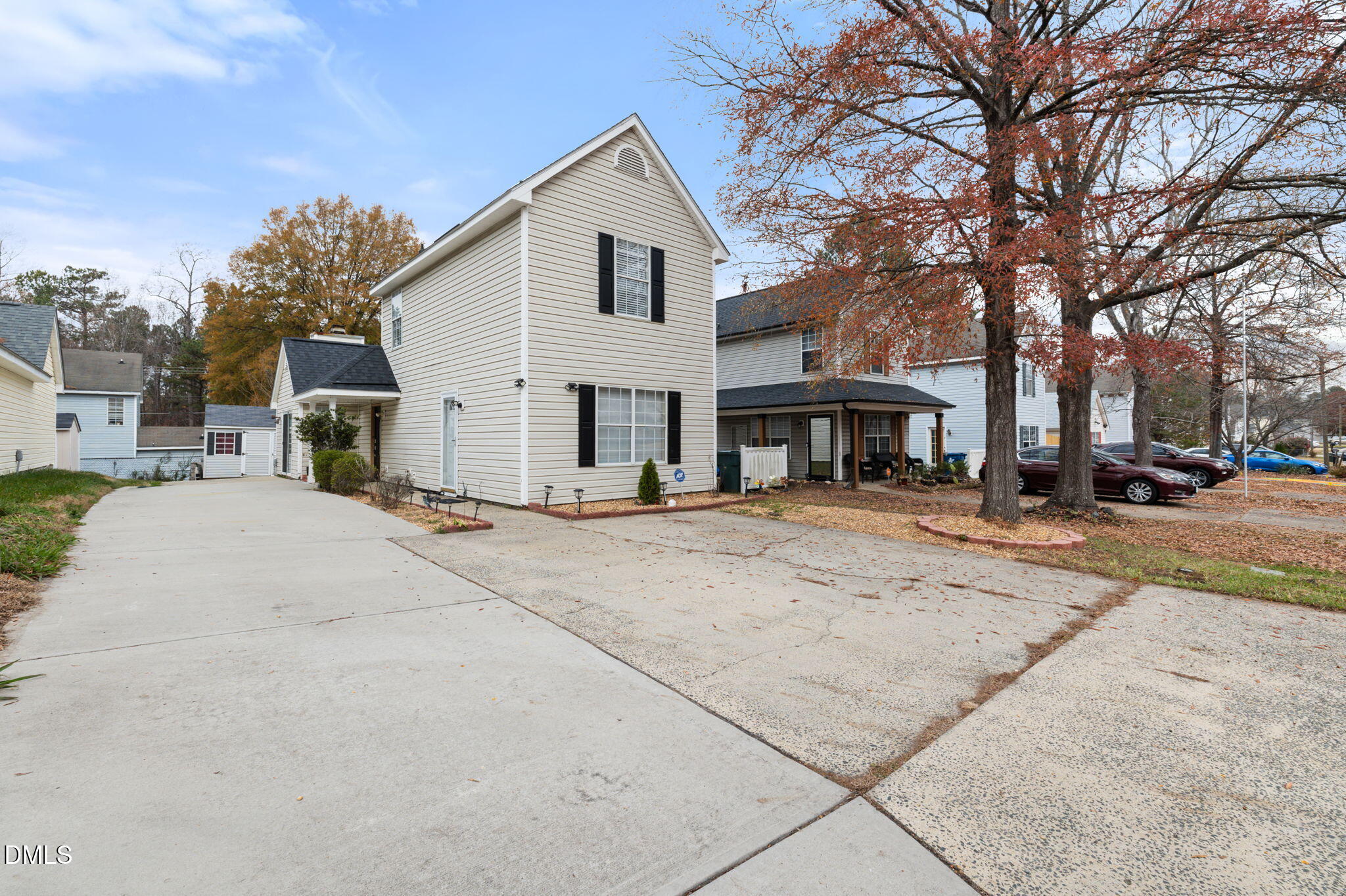 505 Stratton Way Durham, NC 27704 - Photo 24 of 34 a view of a white house with a large tree of the road