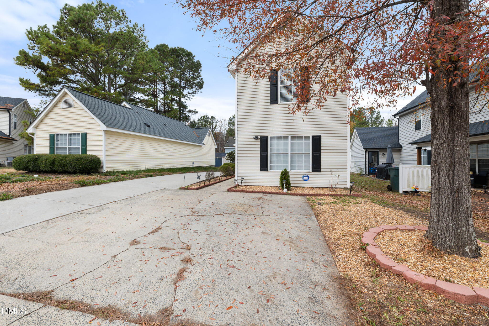 505 Stratton Way Durham, NC 27704 - Photo 28 of 34 a view of a house with a yard and large tree