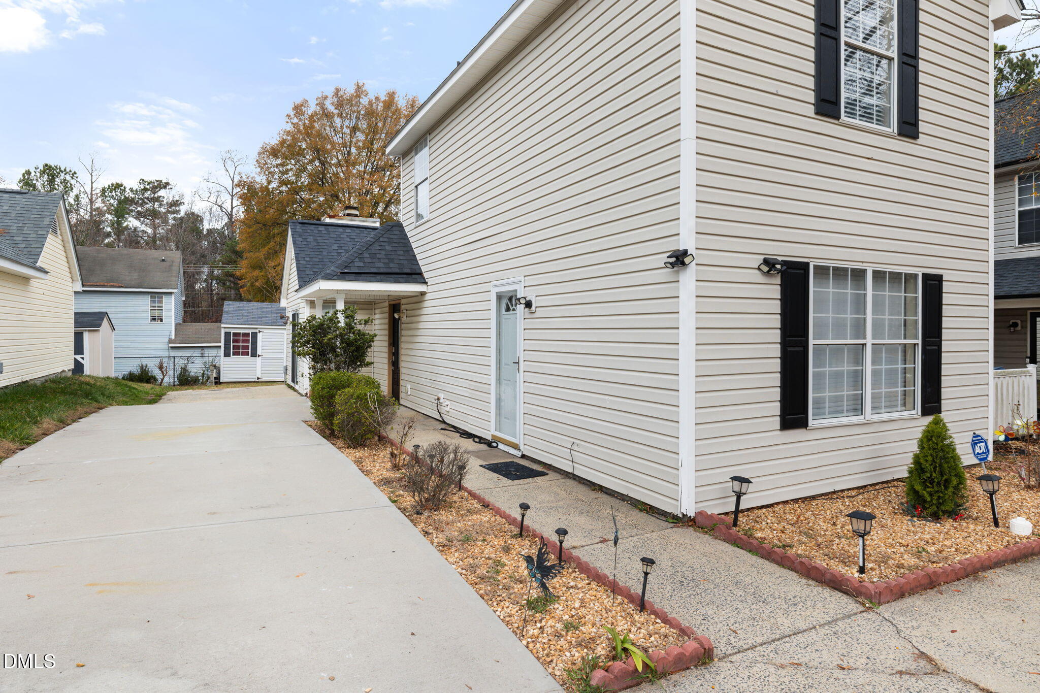 505 Stratton Way Durham, NC 27704 - Photo 29 of 34 a view of a white house with a large windows