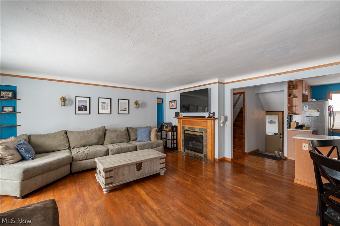 6520 Ridgewood Lakes Drive Parma, OH 44129 - Photo 8 of 34 Operational gas fireplace, solid oak hardwood floors throughout