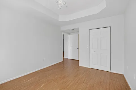 a view of a swimming pool with lounge chairs