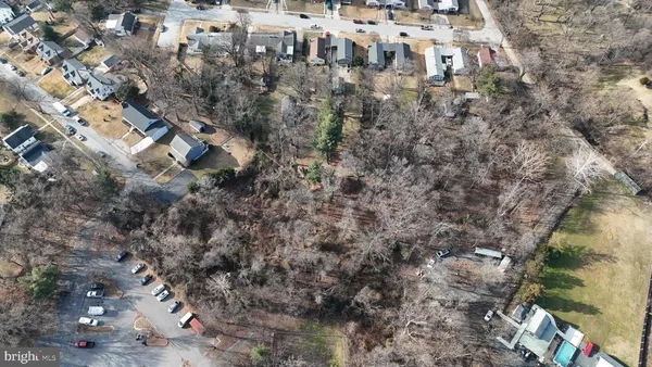 a view of residential houses with outdoor space