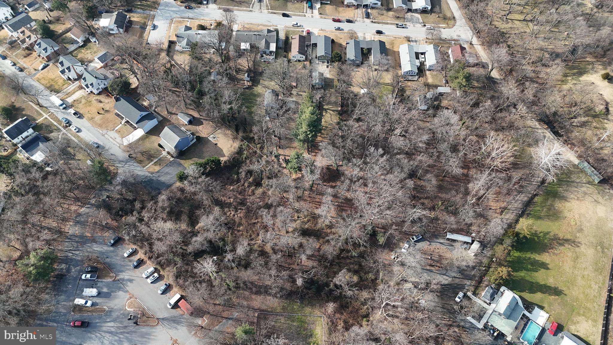 Dewitt Road Baltimore, MD 21227 - Photo 3 of 12 a view of residential houses with outdoor space