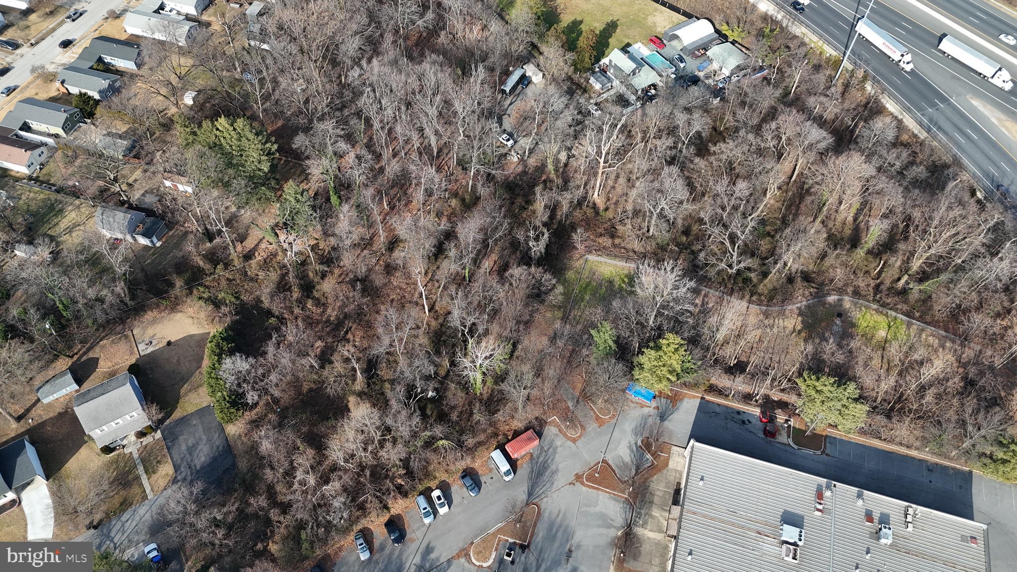 Dewitt Road Baltimore, MD 21227 - Photo 7 of 12 an aerial view of a house with a yard