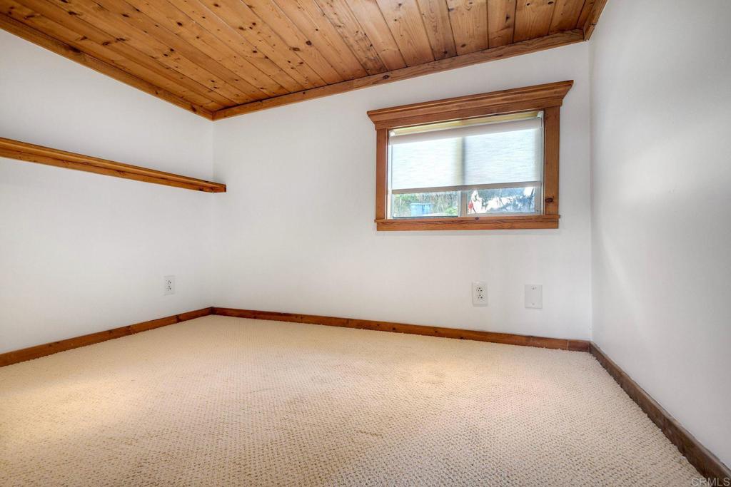 123 Jasper Street, Unit 35 Encinitas, CA 92024 - Photo 21 of 28 a view of an empty room with a window