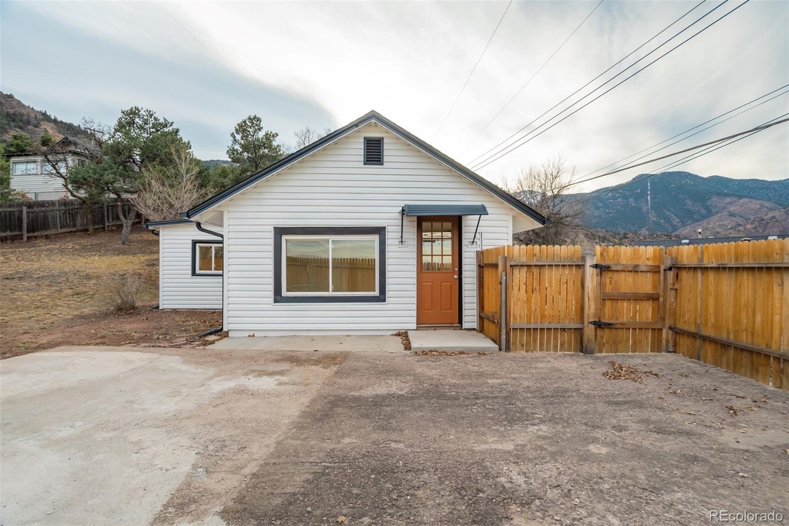 202 Oklahoma Road Manitou Springs, CO 80829 - Photo 1 of 41 a view of a backyard