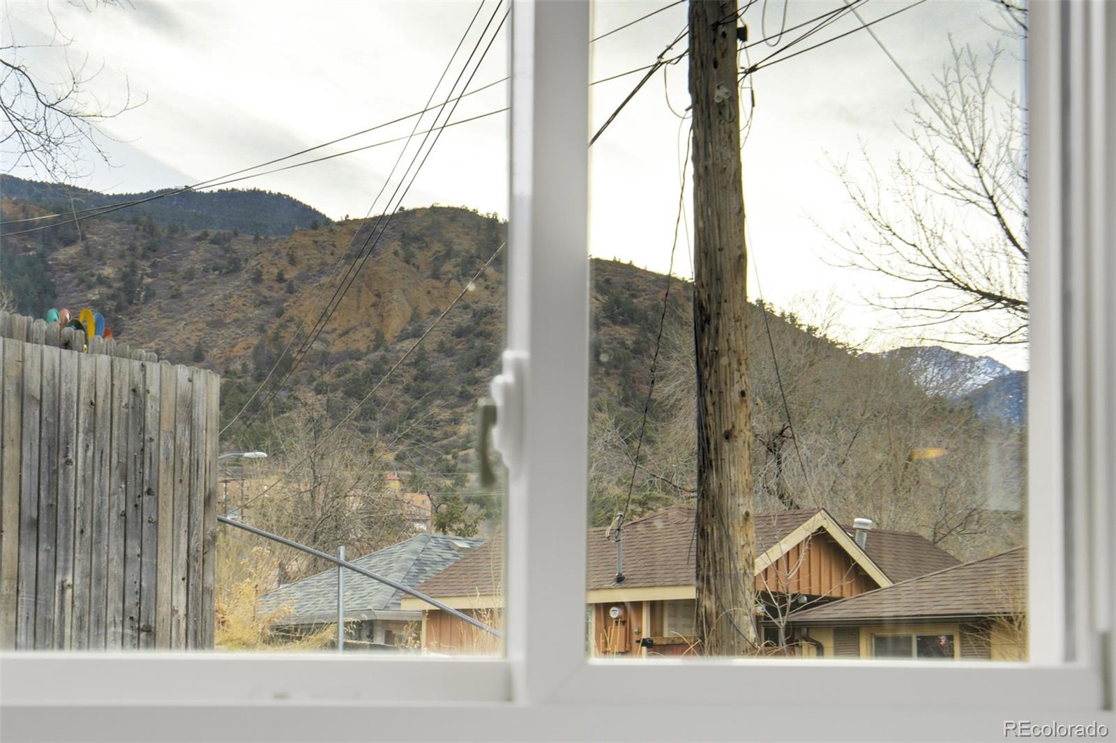 202 Oklahoma Road Manitou Springs, CO 80829 - Photo 14 of 41 a view of a door and two windows