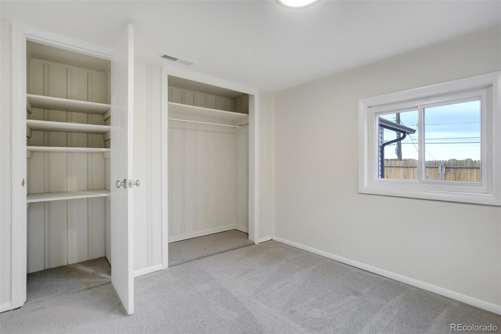 202 Oklahoma Road Manitou Springs, CO 80829 - Photo 21 of 41 a view of an empty room with a window