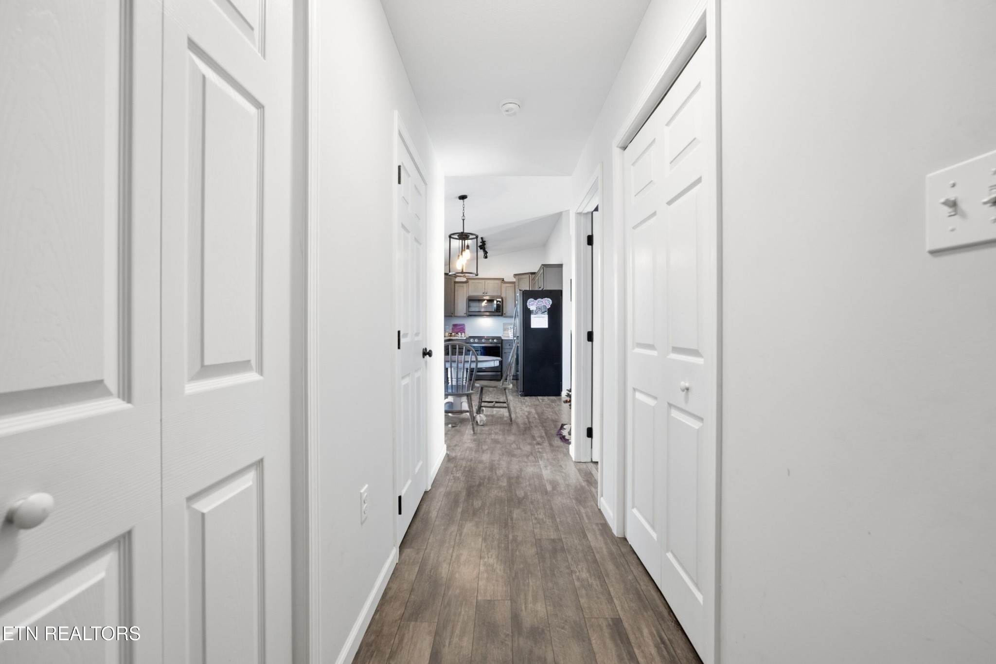 722 Williams Creek Road Oneida, TN 37841 - Photo 17 of 22 a view of a hallway with wooden floor