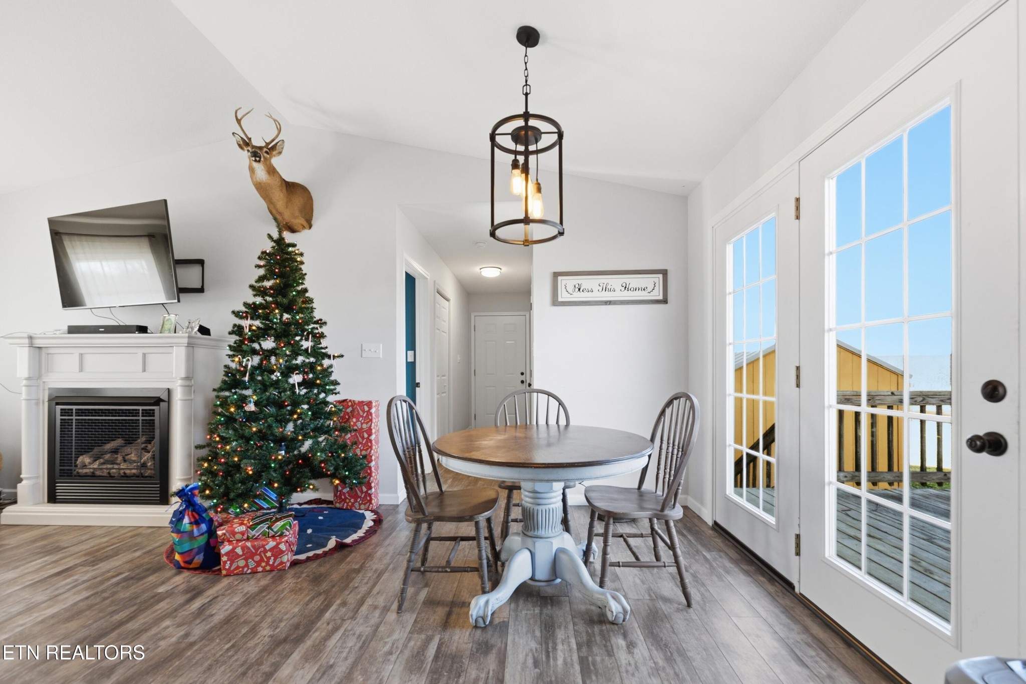 722 Williams Creek Road Oneida, TN 37841 - Photo 6 of 22 a dining room with furniture window and wooden floor