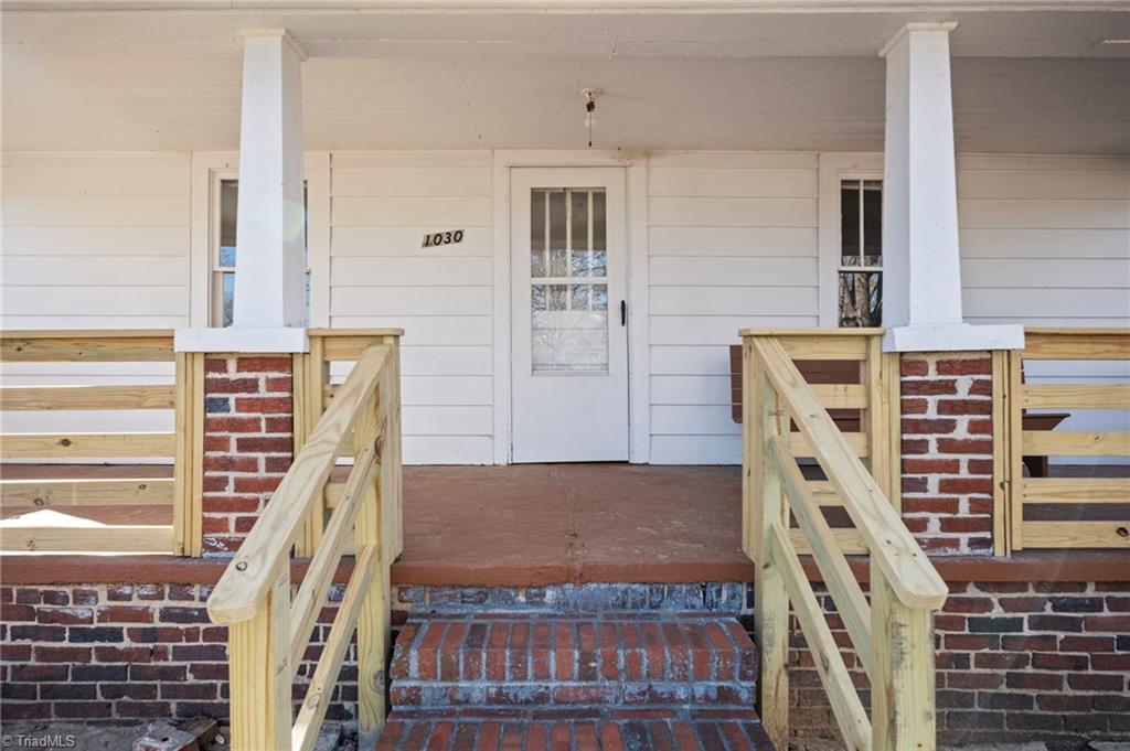 1030 Pole Bridge Road Pine Hall, NC 27042 - Photo 5 of 34 New front porch railing