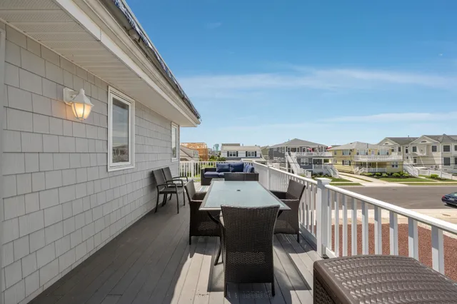 a view of a terrace with furniture