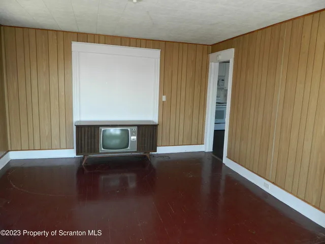 a view of a livingroom with a fireplace